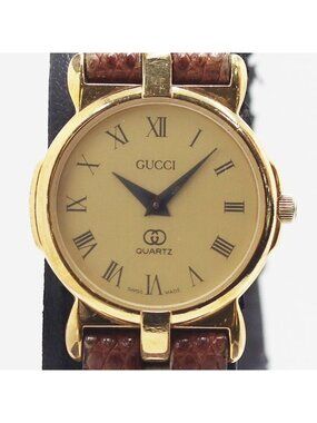 Gucci Quartz Gold Dial Watch Nam